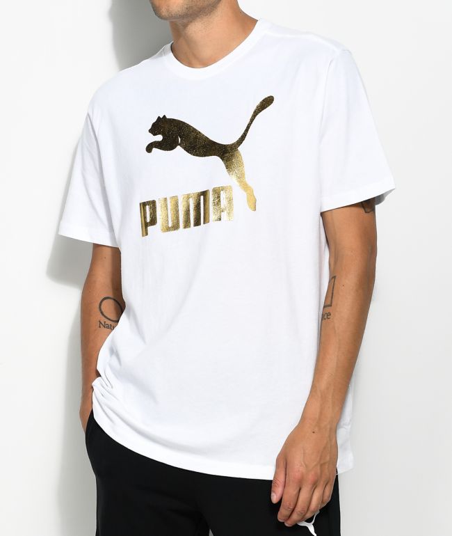 white and gold puma shirt